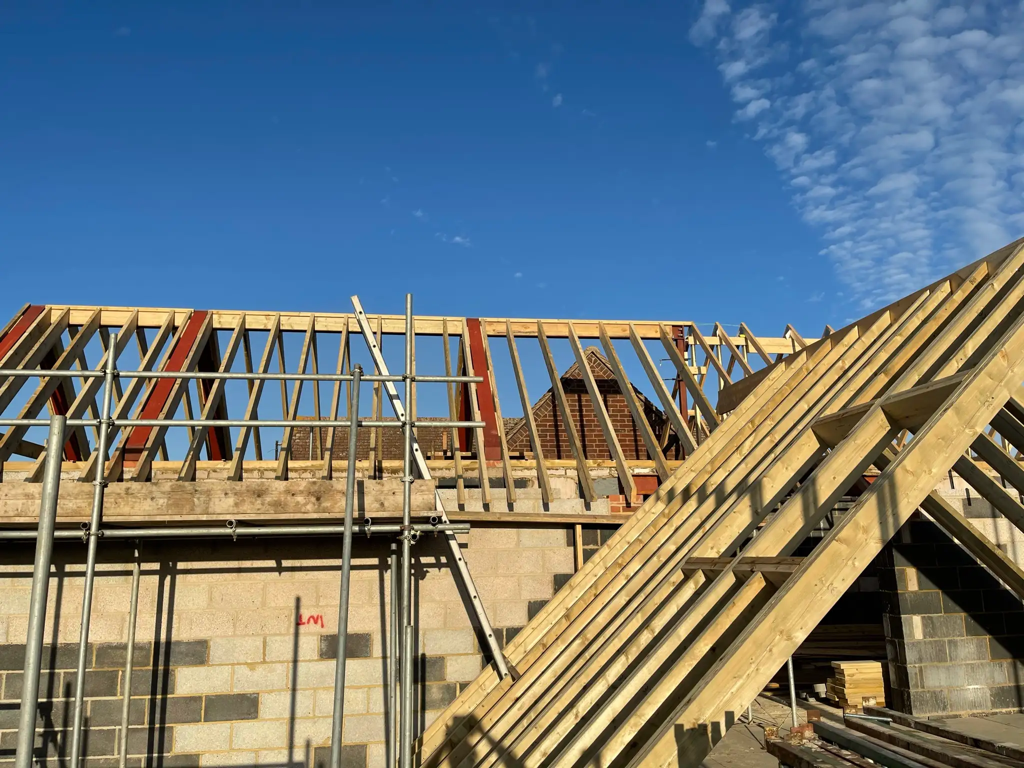 Roof trusses craned into place on a new build