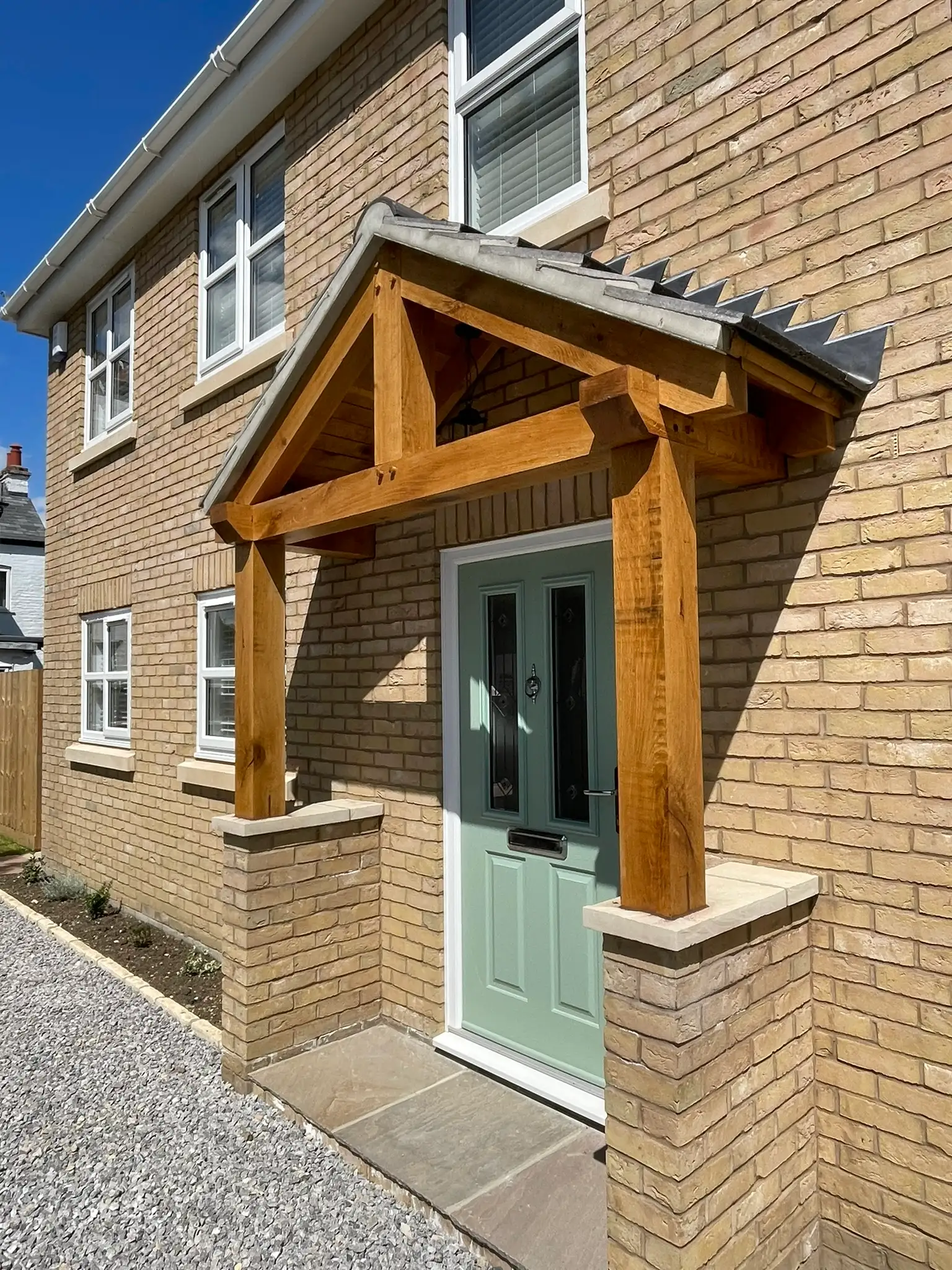 Bespoke oak porch on a brick frontage