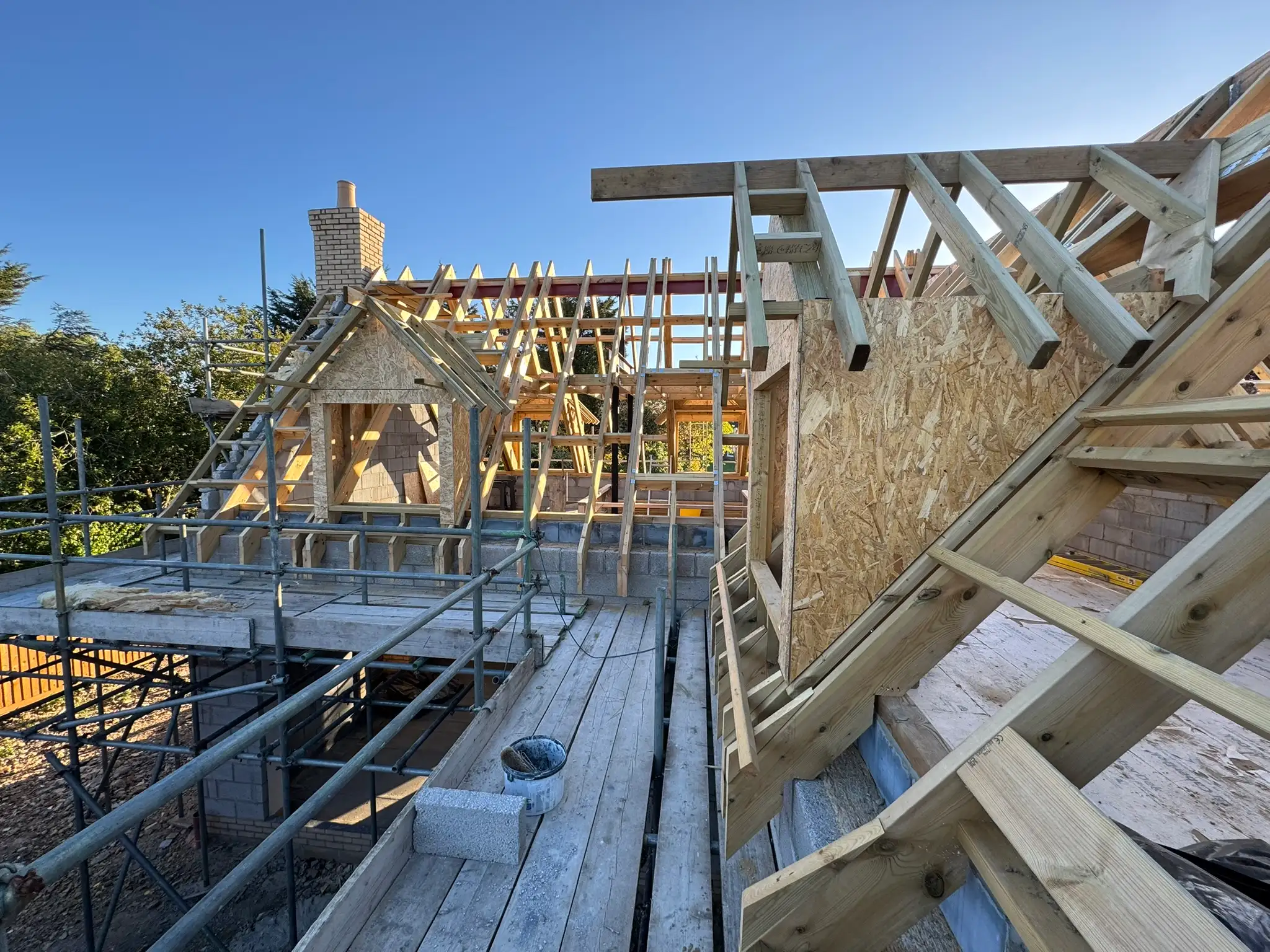 Intricate cut roof over a two storey extension