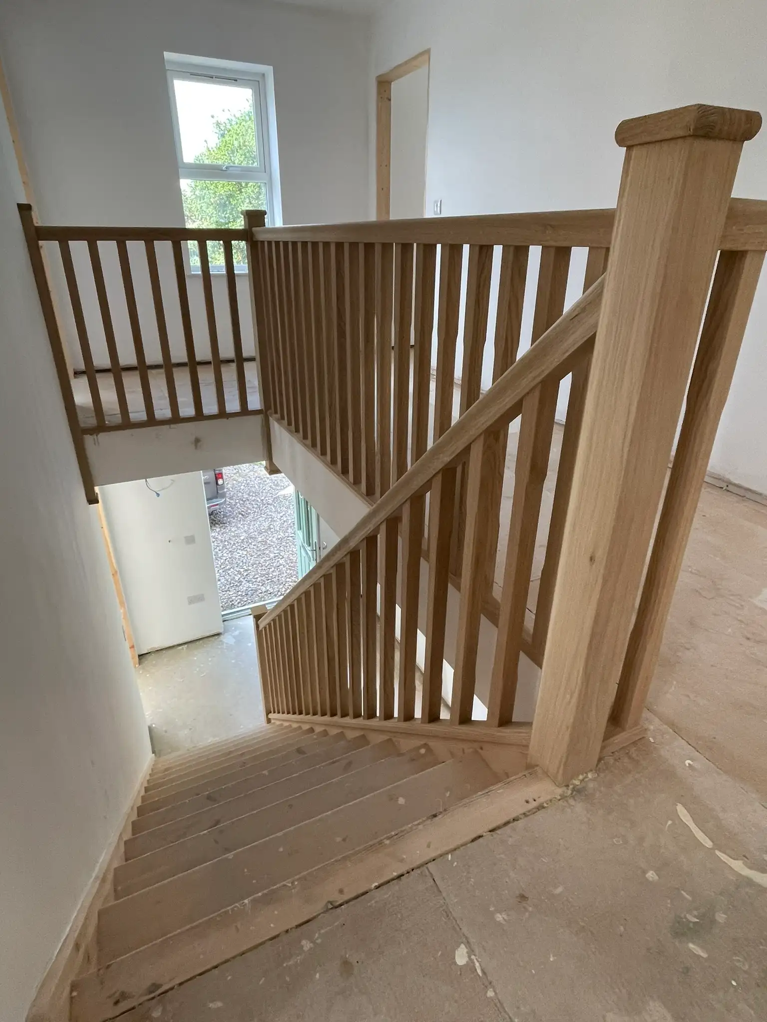 Oak staircase and balustrade fitted on a landing