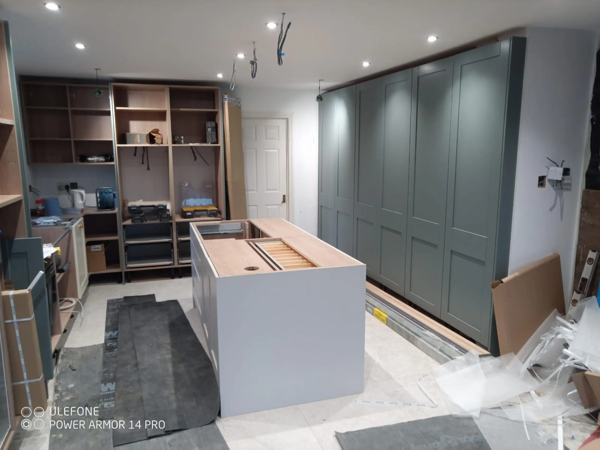Kitchen installation and cabinetry in progress
