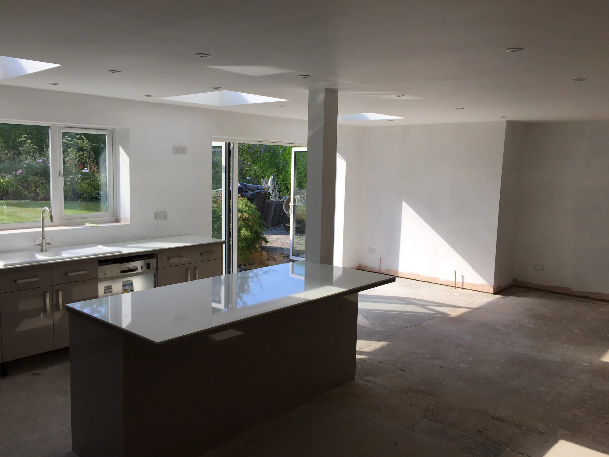 Finished kitchen and island installed by Ablewood
