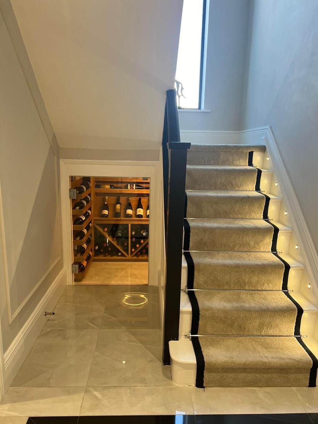 Staircase and wine store in an Ablewood build