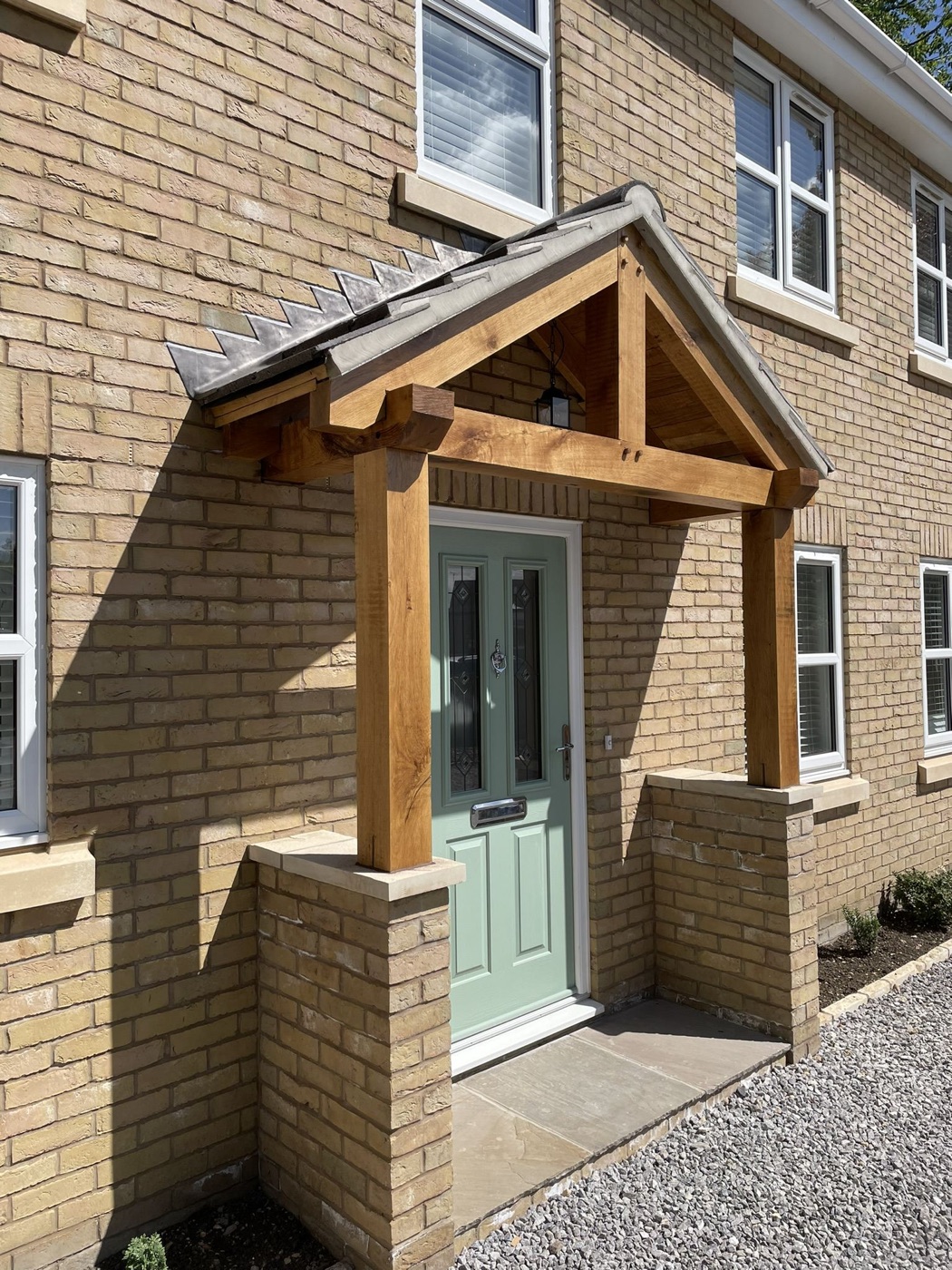 Oak porch and brick frontage by Ablewood